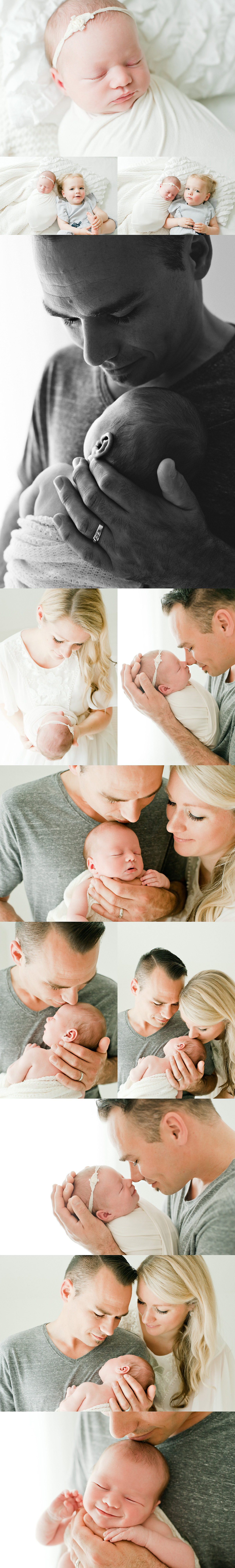 baby girl in parents arms during newborn photography session