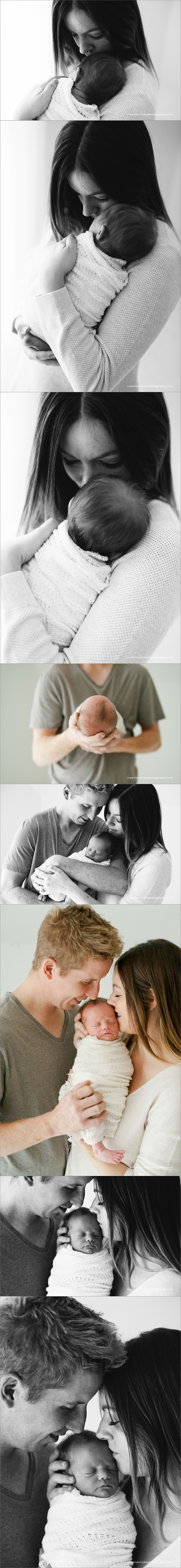newborn baby lovingly held in parents arms