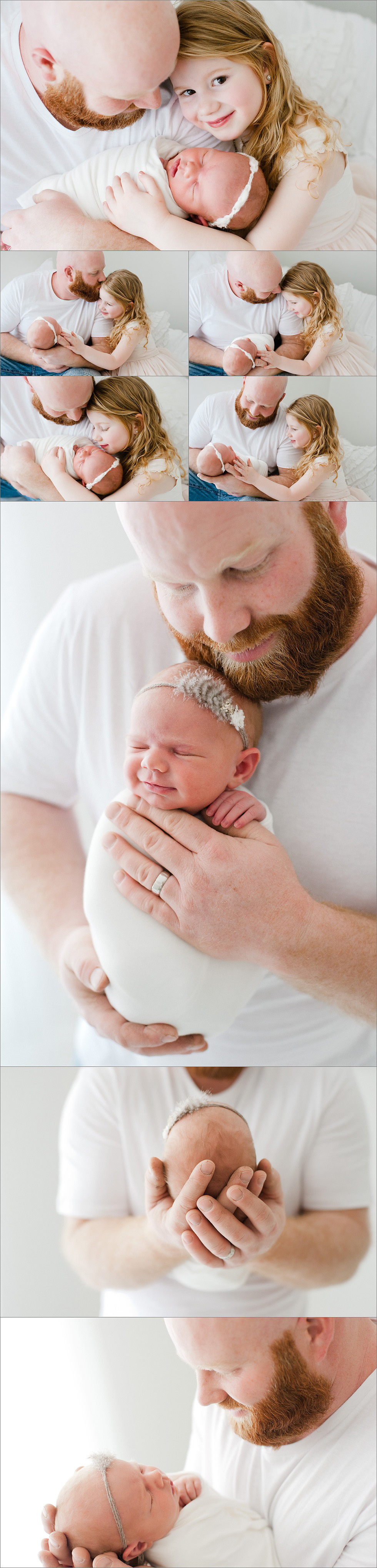 daddy holding his newborn baby girl